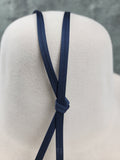Navy color example of 2 ply cord hat band on a pure beaver hat body 